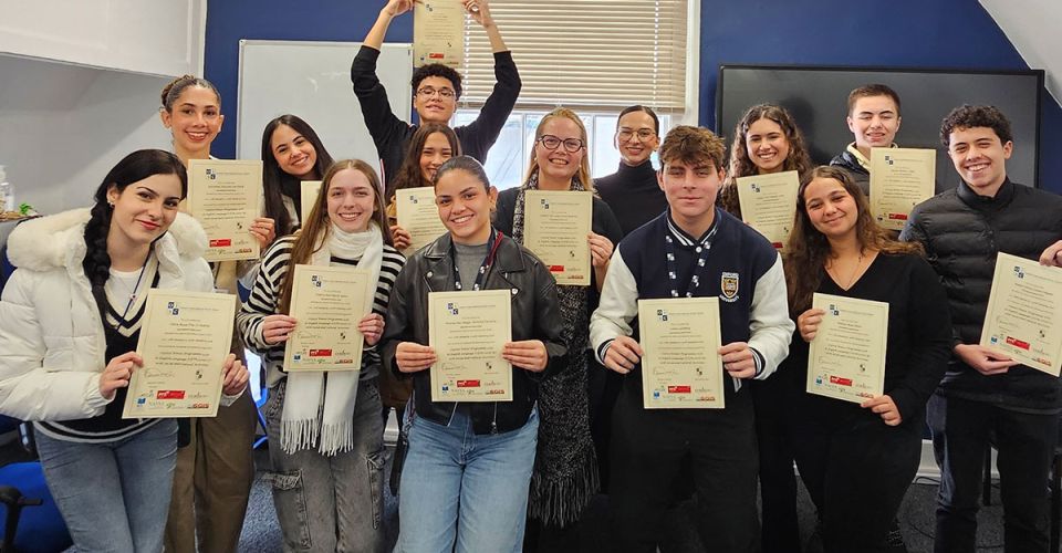 group of students with certificates