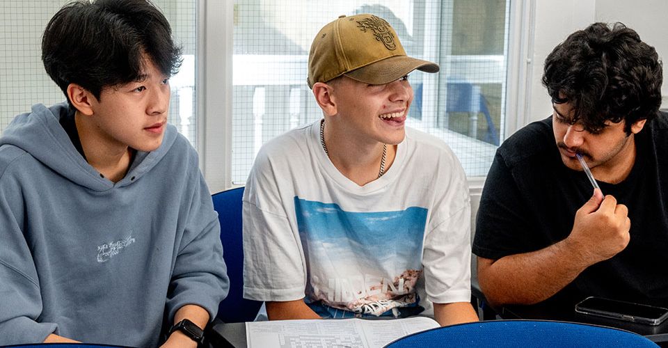 3 students enjoying work